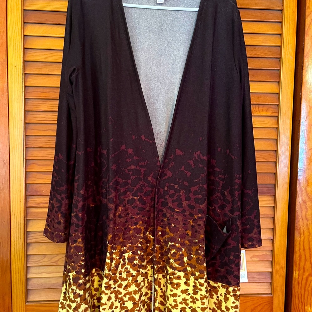LulaRoe, size Large , never worn, with tags. Wraps.